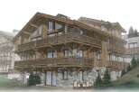 Discover the charm of this stunning chalet-style property, featuring a beautiful wooden facade and stone accents.