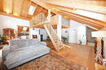 Experience the charm of this stunning property featuring a unique wooden interior design.