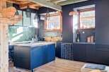 Discover this stunning property featuring a modern kitchen with a stylish island and ample storage.