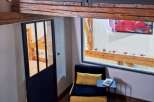 Discover this charming property featuring a unique loft design with exposed wooden beams, creating a warm and inviting atmosphere.