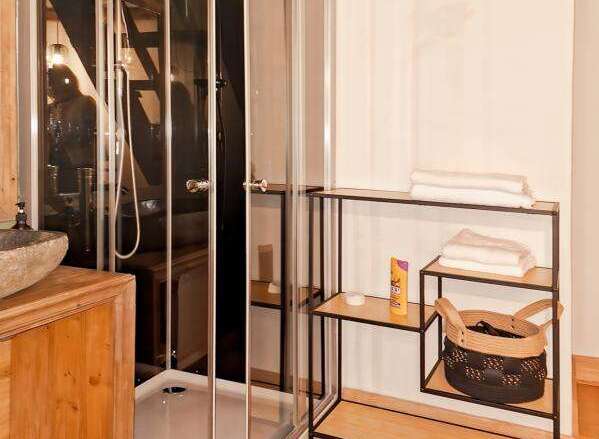 Discover this stunning property featuring a modern shower enclosure, perfect for a refreshing start to your day.
