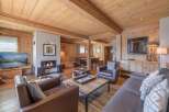 This stunning living room boasts a cozy fireplace, perfect for chilly evenings.