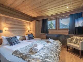 Experience the ultimate in alpine luxury with this stunning bedroom.