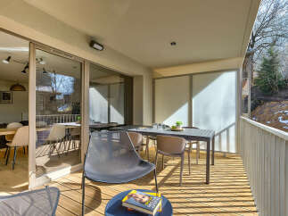 Enjoy the stunning views from this modern balcony, perfect for relaxing or entertaining.