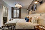 Experience the epitome of comfort in this stylish bedroom.