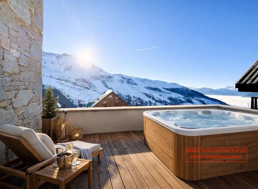 Enjoy breathtaking mountain views from this luxurious property featuring a private hot tub.