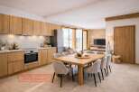 Experience modern living in this stunning property, featuring a beautifully designed kitchen with sleek cabinetry and top-of-the-line appliances.