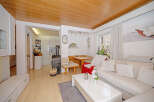 This charming living space features a cozy seating area with a comfortable sofa and a stylish coffee table.
