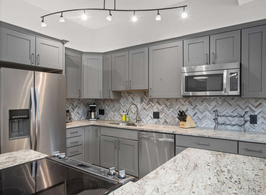 This stunning kitchen boasts modern design and functionality.