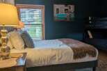 This cozy bedroom features a comfortable bed, perfect for a relaxing stay.