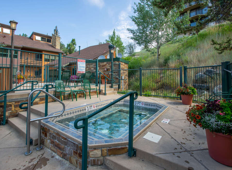 Enjoy the ultimate relaxation in this stunning outdoor hot tub, perfect for unwinding after a long day.