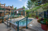 Enjoy the ultimate relaxation in this stunning outdoor hot tub, perfect for unwinding after a long day.