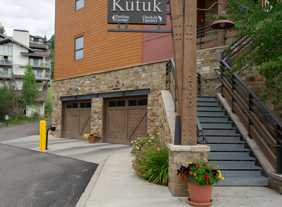Discover the charm of this property, featuring a welcoming facade and convenient parking garage access.