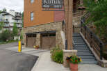 Discover the charm of this property, featuring a welcoming facade and convenient parking garage access.