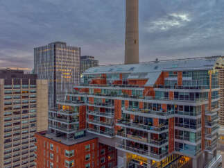 Discover luxury living in this stunning high-rise condo featuring modern architecture and breathtaking city views.