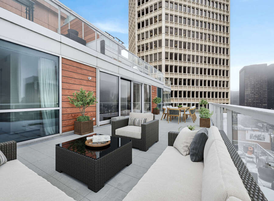Experience luxury living at its finest with this stunning rooftop terrace.