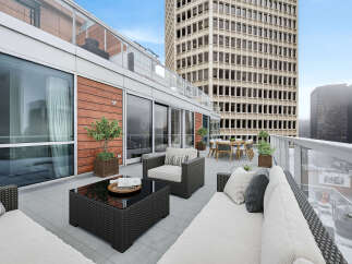 Experience luxury living at its finest with this stunning rooftop terrace.