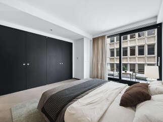 Experience luxury living in this stunning bedroom.