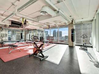 This modern gym offers a bright and airy space for your fitness routine.