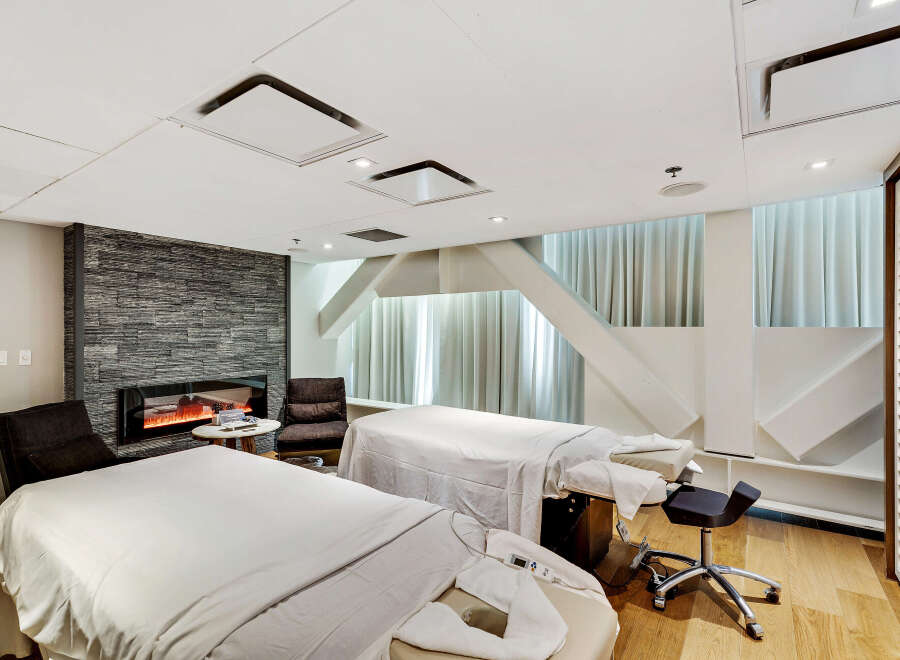 Indulge in ultimate relaxation within this serene spa-like retreat.