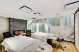 Indulge in ultimate relaxation within this serene spa-like retreat.