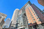 Explore the architectural marvel of this modern building, showcasing a blend of glass and brick facades.