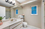 This inviting bathroom features a clean and bright design, perfect for relaxation.