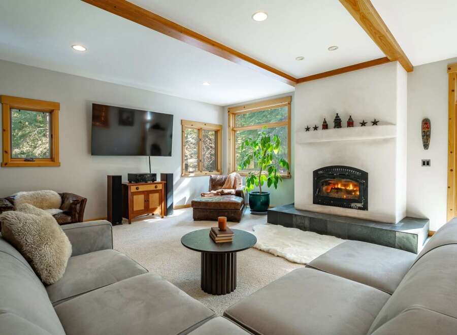 This stunning living room features a cozy fireplace, perfect for those chilly evenings.