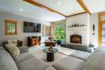 This stunning living room features a cozy fireplace, perfect for those chilly evenings.