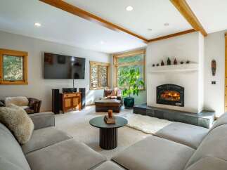 This stunning living room features a cozy fireplace, perfect for those chilly evenings.
