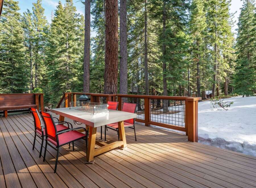 Enjoy the tranquility of nature from this stunning outdoor deck.