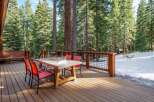 Enjoy the tranquility of nature from this stunning outdoor deck.