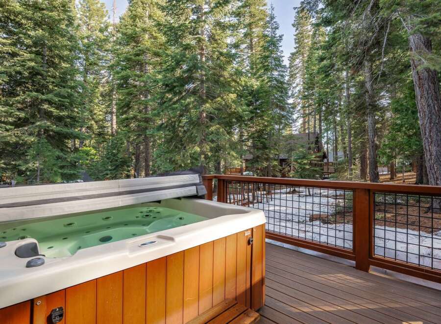 Enjoy the ultimate relaxation in this stunning property featuring a luxurious hot tub.