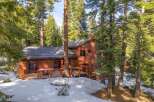 Nestled amidst towering trees and a serene snowy landscape, this stunning property offers a perfect blend of nature and luxury.