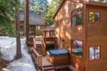 Experience mountain living in this charming wooden cabin, perfect for a cozy getaway.