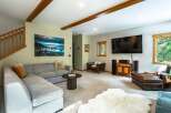 Experience cozy living in this inviting living room, featuring a spacious sectional sofa perfect for relaxation and entertainment.