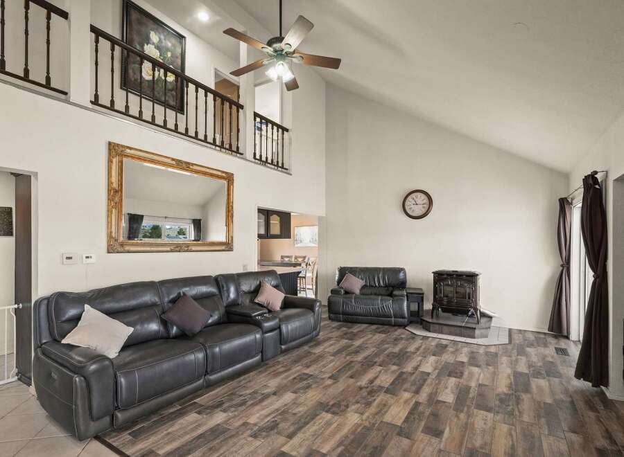 Step into luxury with this stunning living room! Featuring a spacious layout, this home offers ample space for relaxation and entertainment.