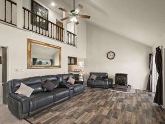 Step into luxury with this stunning living room! Featuring a spacious layout, this home offers ample space for relaxation and entertainment.