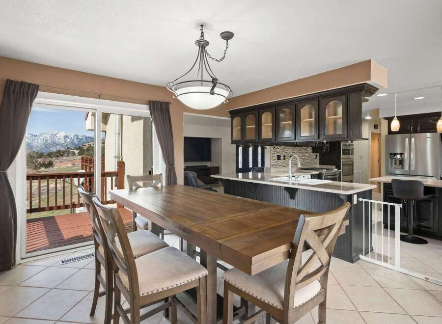 This stunning property boasts a spacious dining area, perfect for entertaining guests.