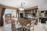 This stunning property boasts a spacious dining area, perfect for entertaining guests.