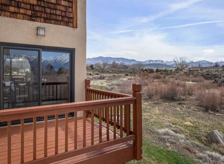 Enjoy breathtaking mountain views from this stunning property! This home features a spacious deck, perfect for relaxing and taking in the natural beauty.