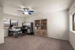 This inviting home office features a spacious layout with ample natural light.