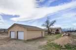 Discover this stunning property featuring a spacious garage, perfect for storing vehicles and equipment.