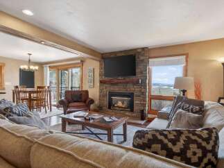 This stunning living room features a cozy fireplace, perfect for those chilly evenings.