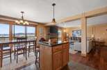 This stunning property boasts a beautifully designed kitchen with a stylish island, perfect for culinary enthusiasts.