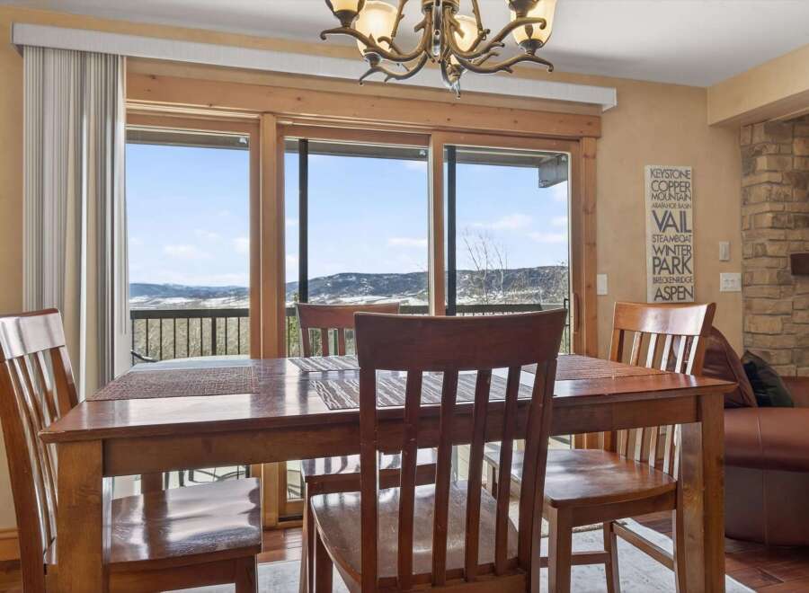 Enjoy breathtaking mountain views from this charming dining room.