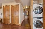 Step into this inviting space, featuring beautiful wooden floors and ample storage.