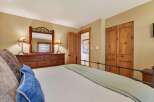 Discover the charm of this inviting bedroom, featuring a cozy bed and a stylish dresser.