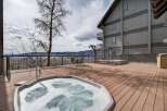 Enjoy breathtaking mountain views from this luxurious property featuring a private hot tub.