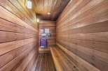 Step into relaxation with this inviting sauna, a perfect addition to any home.